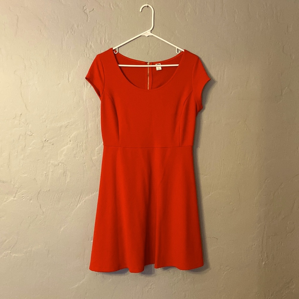 Capped sleeve red dress with gold zipper detail